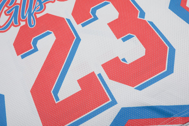Close-up of a white retro football jersey with bold red number 23 outlined in blue and blue trim