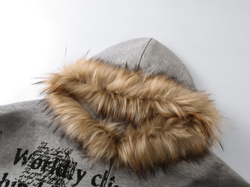 Close-up of gray hood with thick tan faux fur trim around the opening