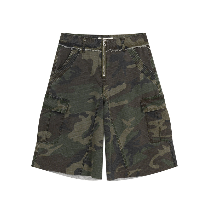 Front view of camouflage cargo shorts with wide legs, center zipper, and raw-edged waistband