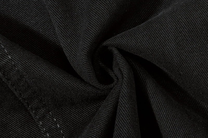Close-up of black shorts fabric texture