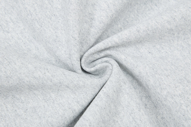 Close-up of light gray hoodie fleece fabric texture