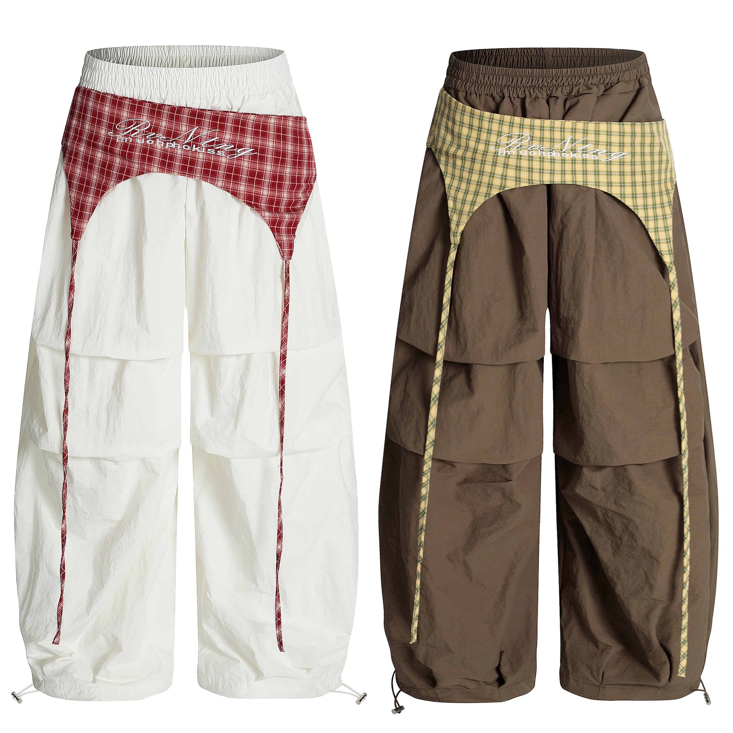 Omirad layered patchwork parachute pants in off-white with red plaid and brown with tan plaid waistband, wide-leg silhouette,