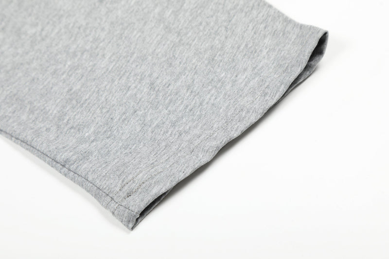 Gray sleeve cuff close-up with hem stitching