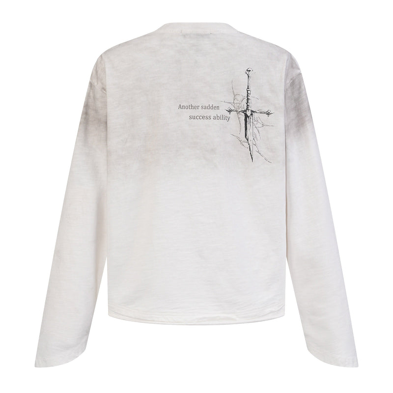 Back of white long sleeve tee with small cross graphic and “Another sadden success ability” text
