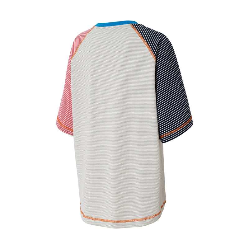 Relaxed fit color block raglan T-shirt with striped sleeves, blue collar, and contrast stitching on a white background