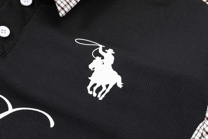 Black polo shirt with white cowboy graphic, plaid collar panels, and white buttons in a retro streetwear style