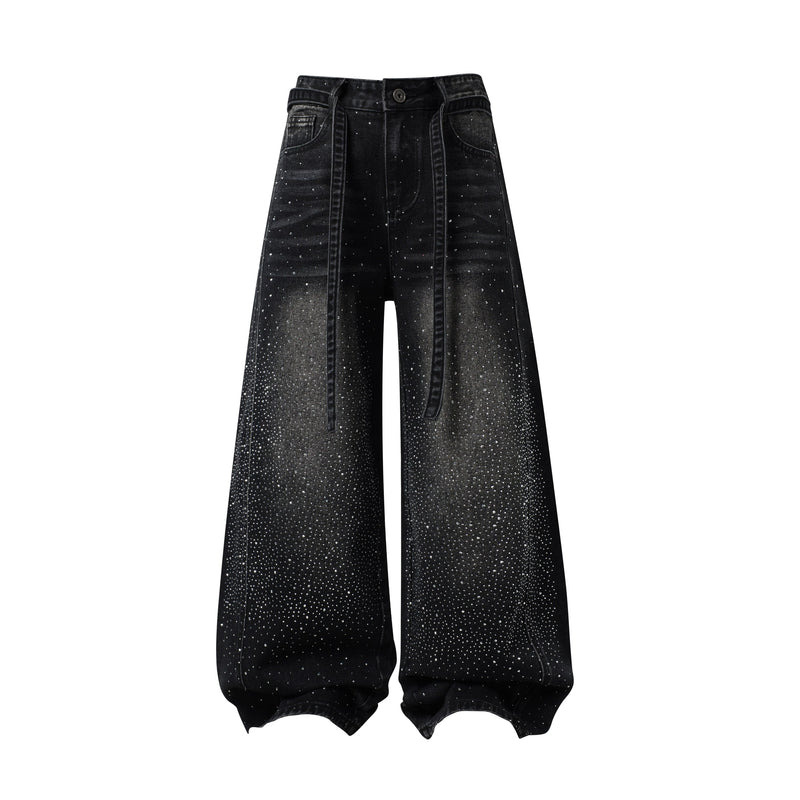 Front view of black wide-leg jeans with rhinestone speckles and long belt ties