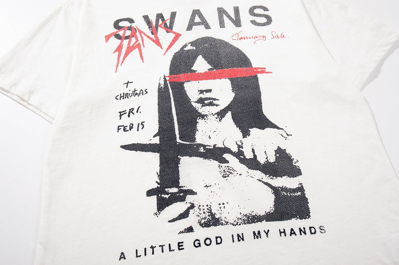 White punk graphic T-shirt with bold SWANS print, red eye stripe, and distressed black portrait design on the chest