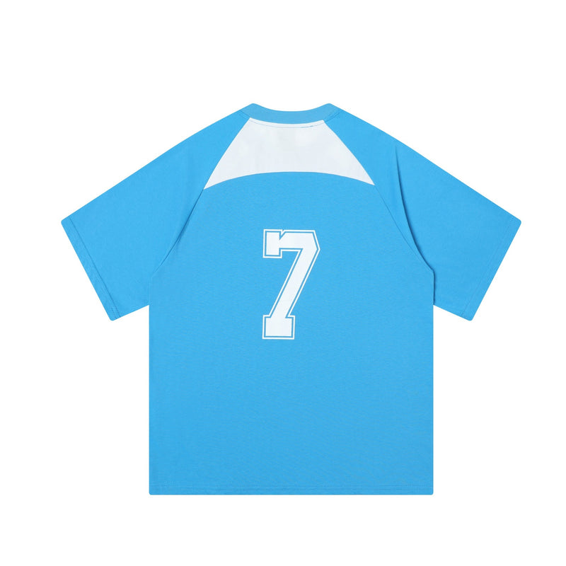 Blue varsity jersey tee with white colorblock yoke and large number 7 graphic on the back