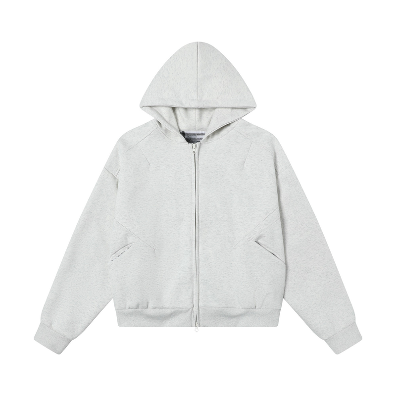 Light gray zip-up hoodie front with panel seams, hood, and ribbed hem on white background