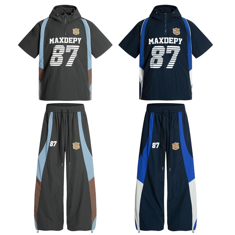 MAXDEPY 87 hooded half-zip jersey and wide-leg pants set in black, navy, and light blue varsity streetwear styling