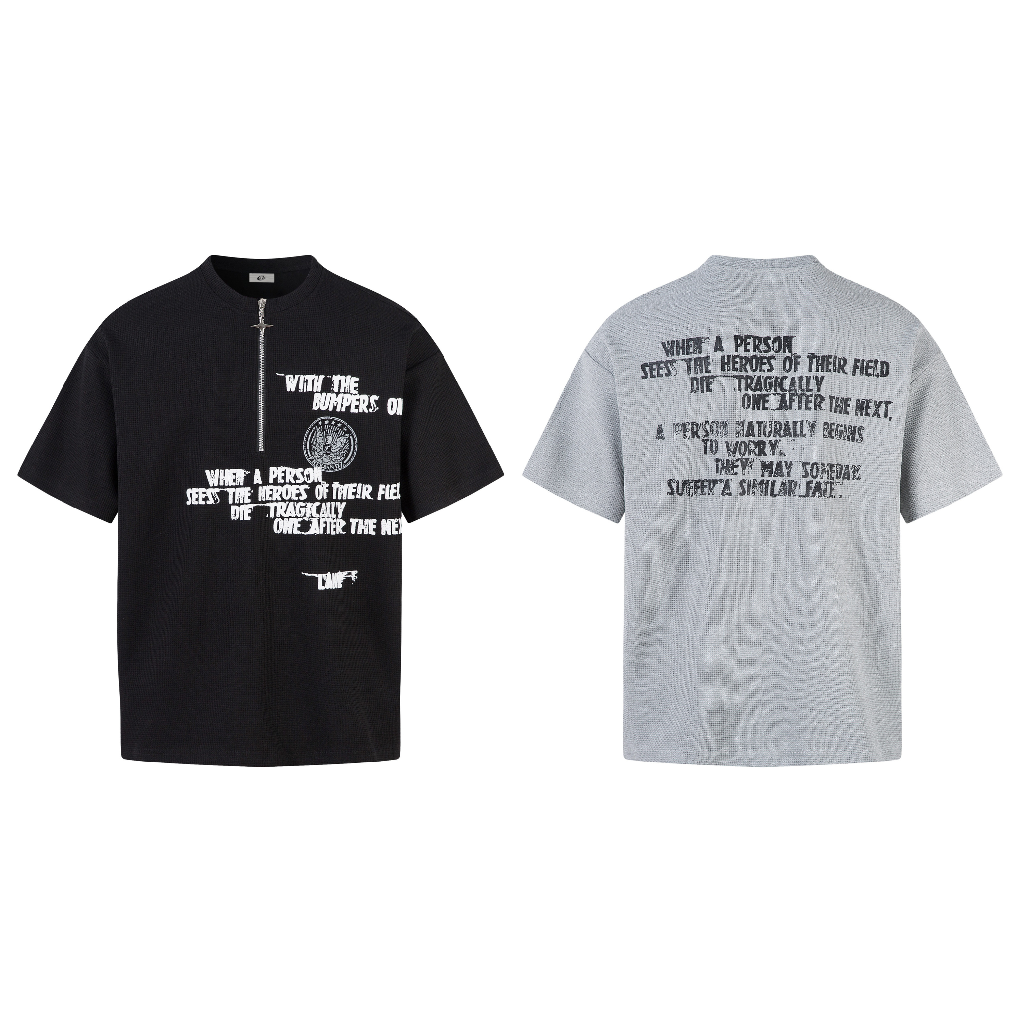 Black half-zip graphic t-shirt with distressed white typography print and circular emblem on front, waffle-knit fabric