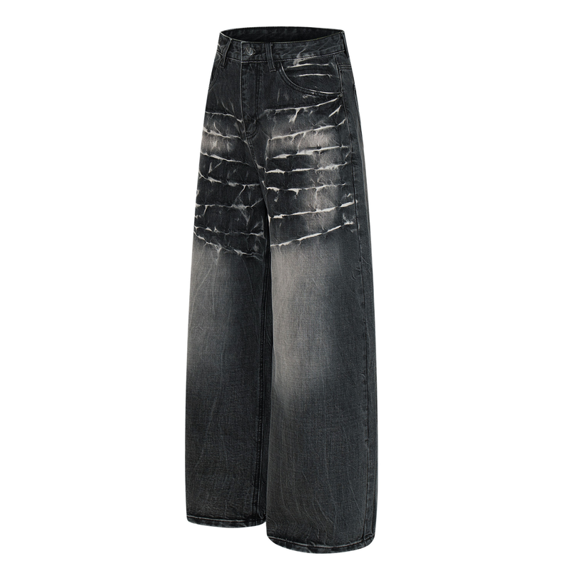 Front angled view of black wide-leg jeans with cracked wash and faded whiskering across the thighs