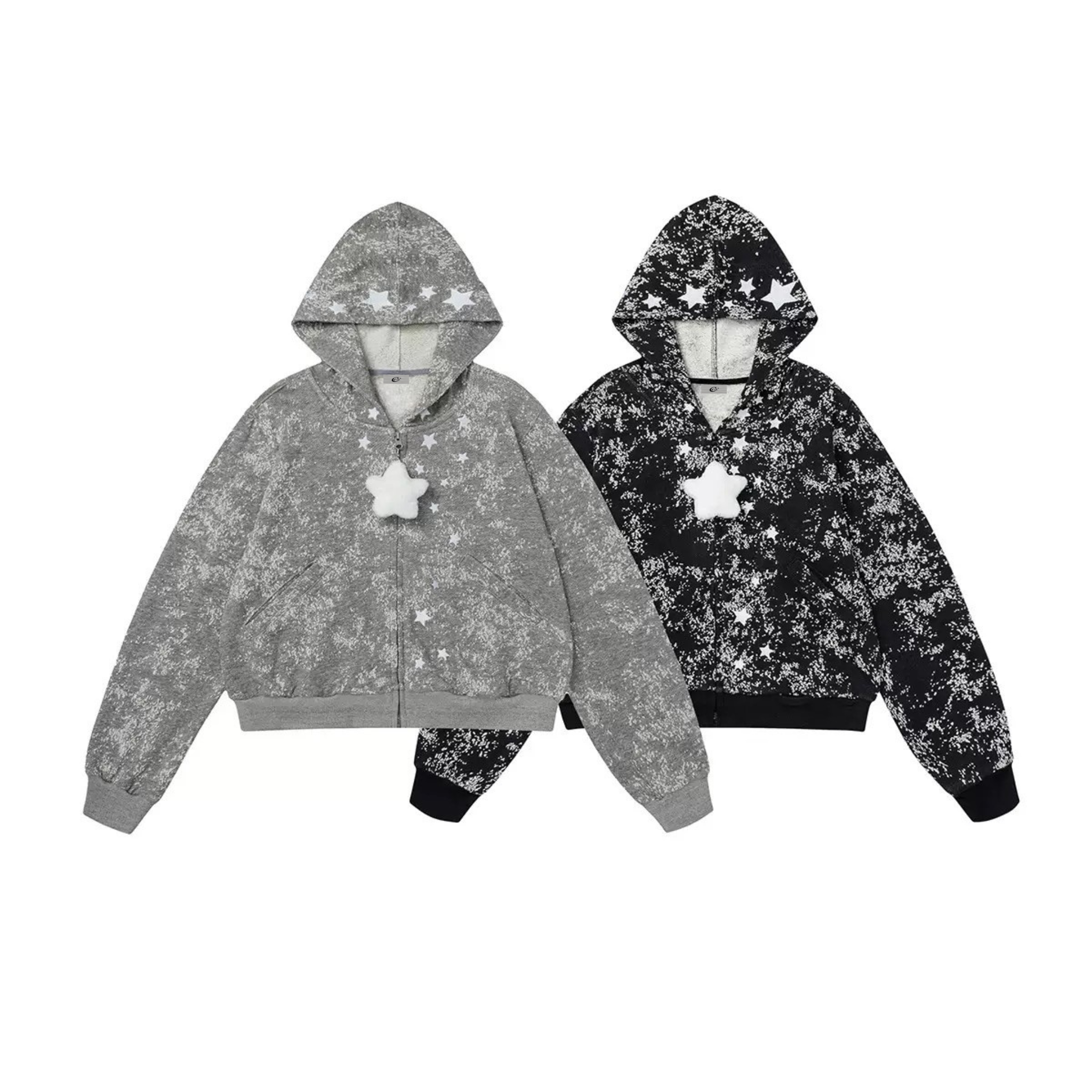 Grey cropped zip hoodie with white starburst splatter print, fleece lining, and detachable plush star charm on zipper