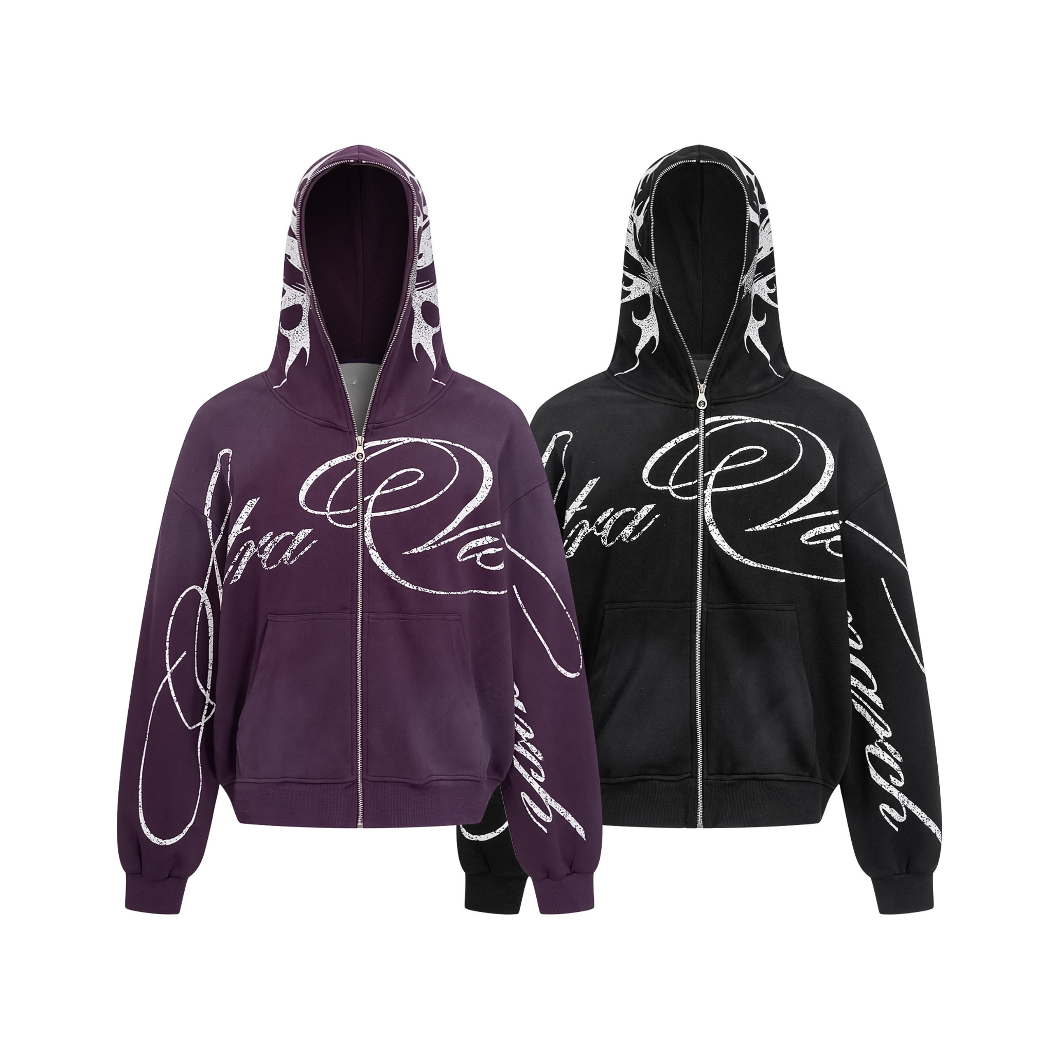 Purple and black oversized zip hoodies with white distressed script graphics across chest, sleeves, and tribal-print hood