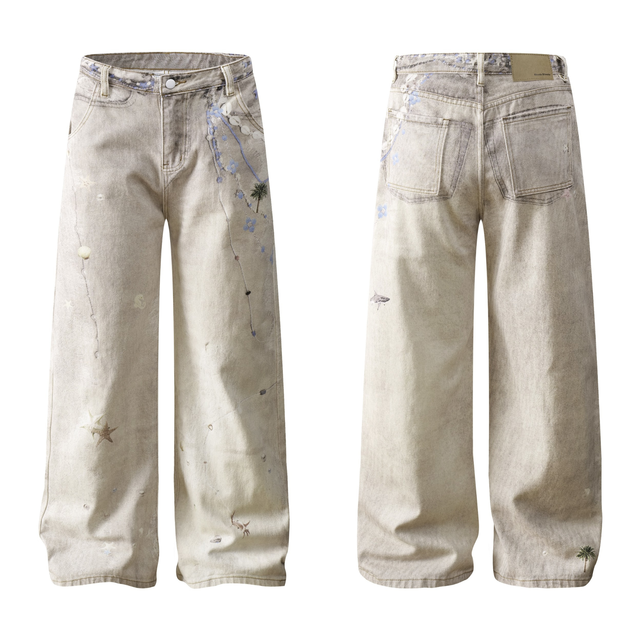 Front and back view of wide-leg washed denim jeans with botanical and coastal print motifs in sandy beige