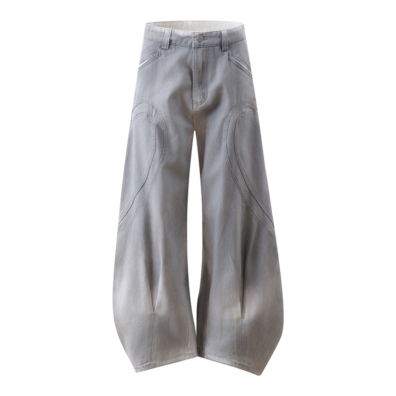 Front view of light gray washed wide-leg jeans with curved panel seams and high waist