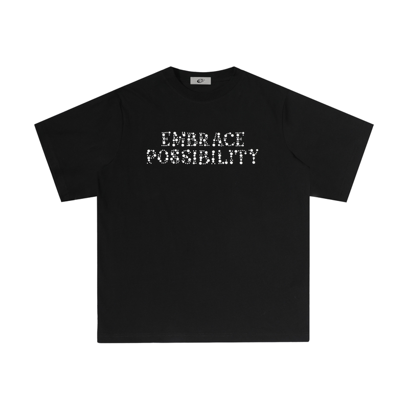 Black oversized T-shirt with rhinestone Embrace Possibility lettering across the chest