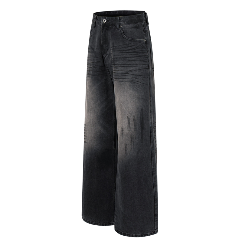 Front angled view of black faded wide-leg jeans with whiskering and classic five-pocket styling
