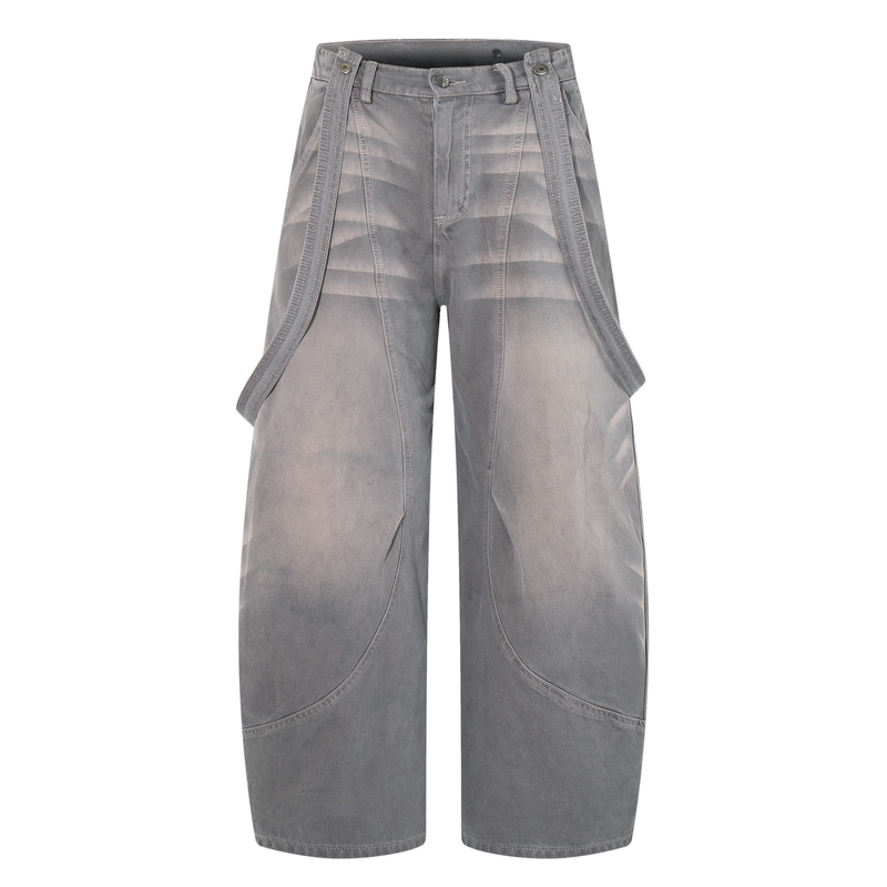 Front view of gray washed wide-leg cargo jeans with belt straps and curved panel seams