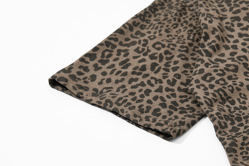 Brown leopard print polo tee sleeve laid flat on white background, showing vintage Y2K streetwear style￼