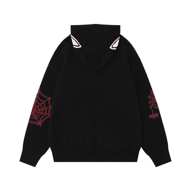 Black oversized hoodie back view with red spiderweb knit sleeves and white hood accents