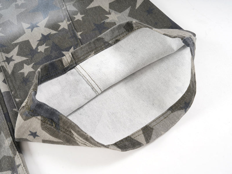 Cuffed hem detail showing white inner lining and star print denim
