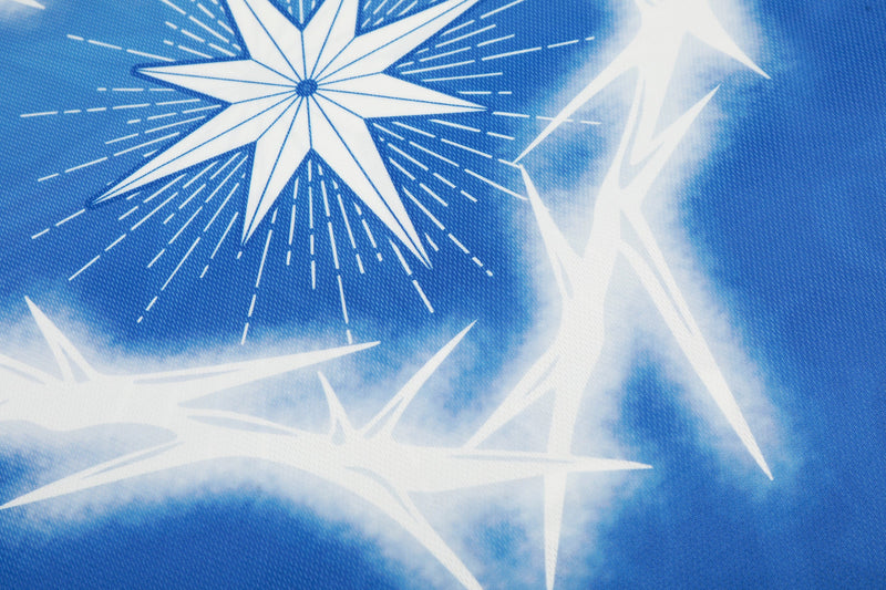 Blue mesh football jersey with bold white starburst graphics and a streetwear-inspired star pattern