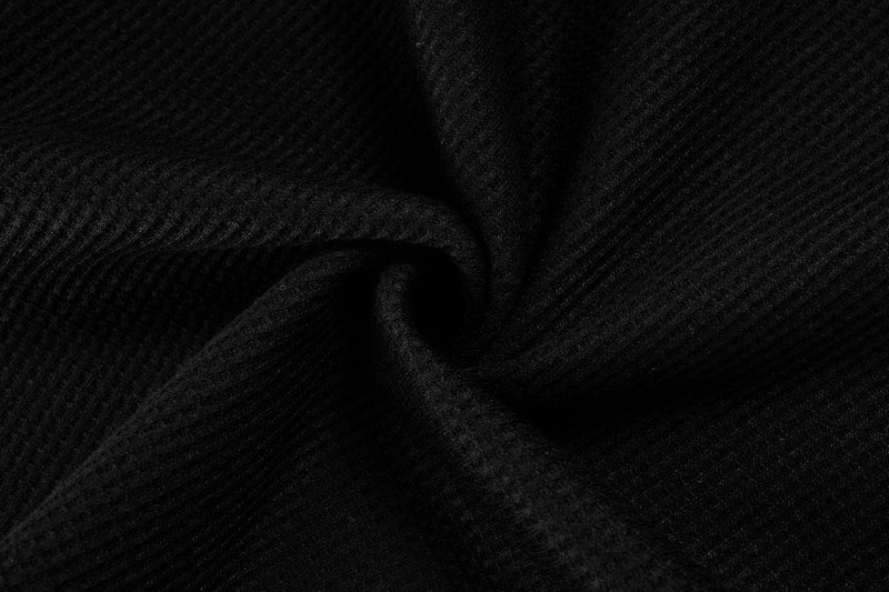 Close-up of black ribbed knit fabric texture