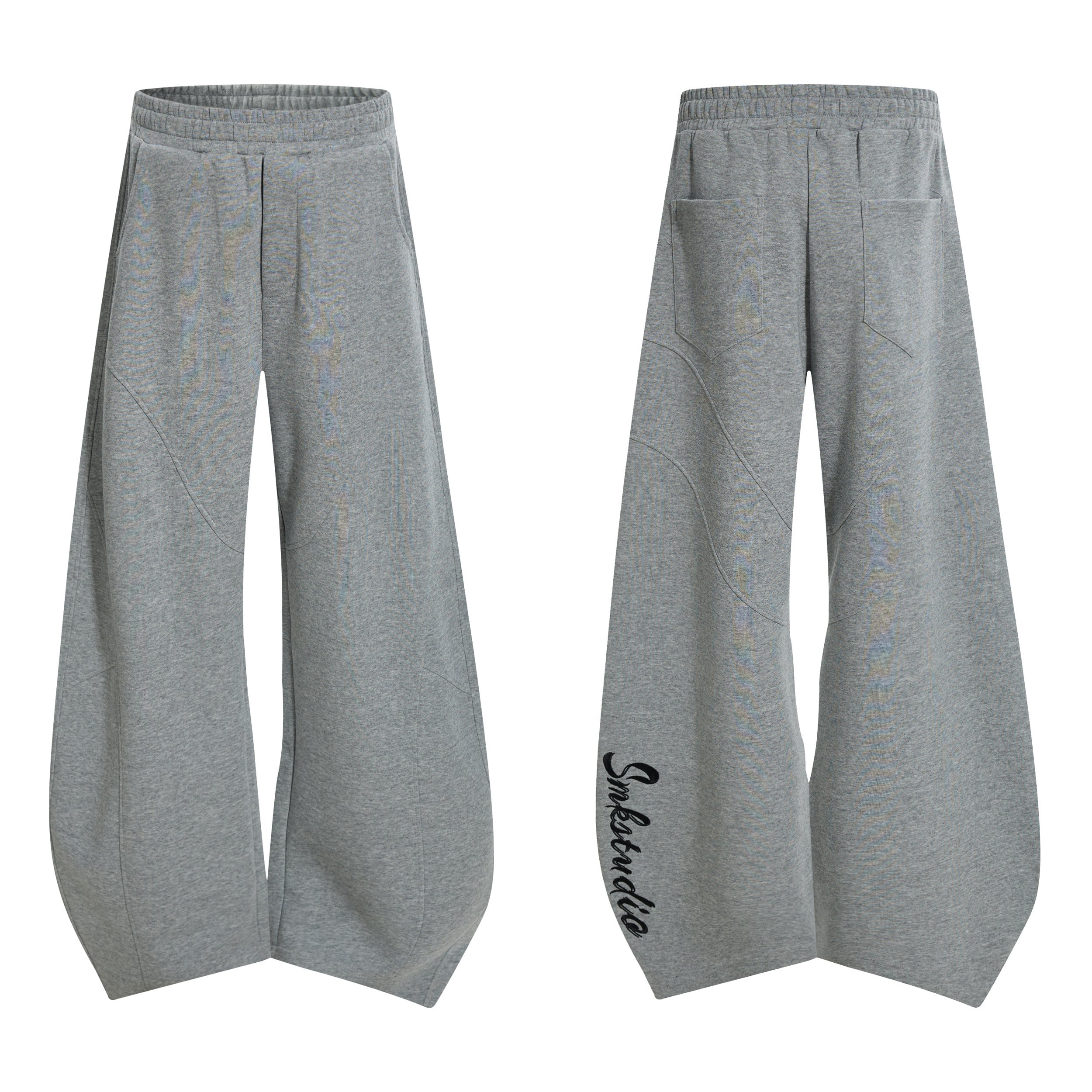 Grey wide-leg sweatpants with curved seam paneling shown from front and back on white background