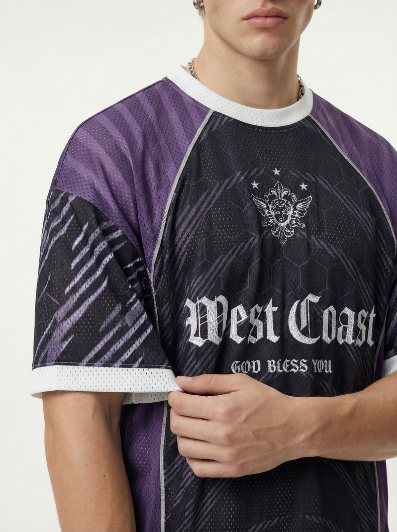 Close-up of a purple and black mesh soccer jersey with Gothic West Coast graphic print and white collar trim