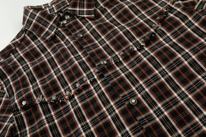 Distressed brown plaid short sleeve shirt with raw edge details and metal snap buttons