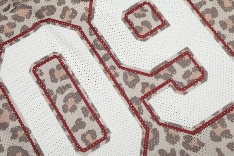 Leopard print varsity jersey number on white mesh fabric with red outlined lettering