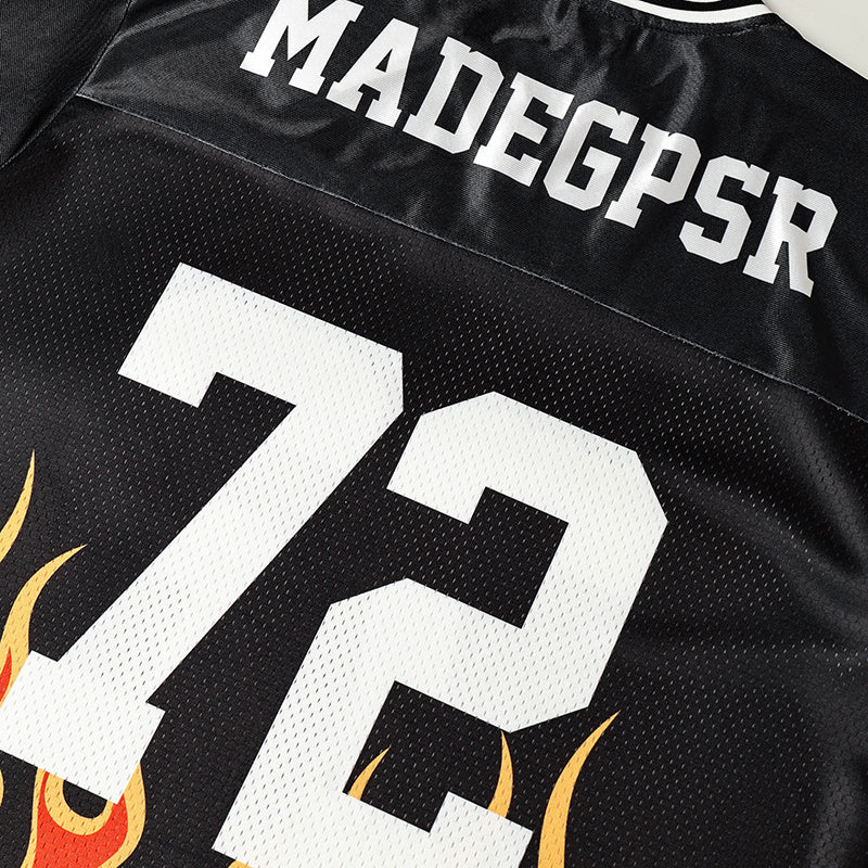 Black mesh football jersey with bold white 72, MADEGPSR lettering, and flame graphics in a varsity streetwear style