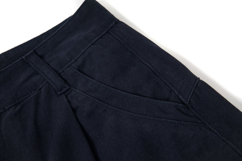 Black cargo pants back yoke and waistband seam close-up