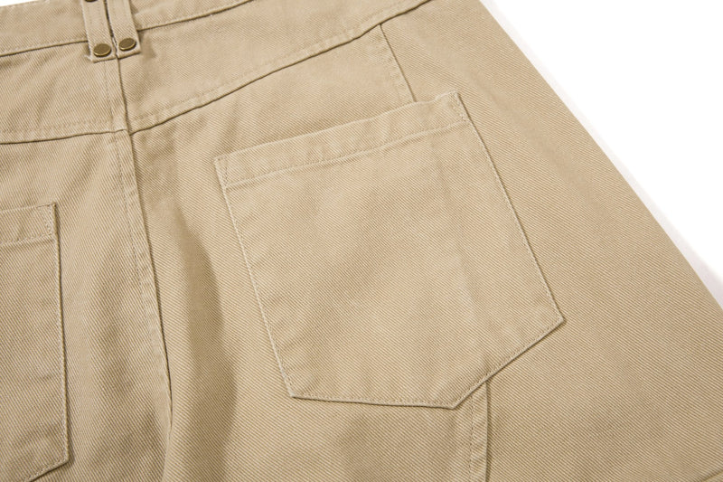 Close-up of khaki back pocket on wide-leg cargo pants