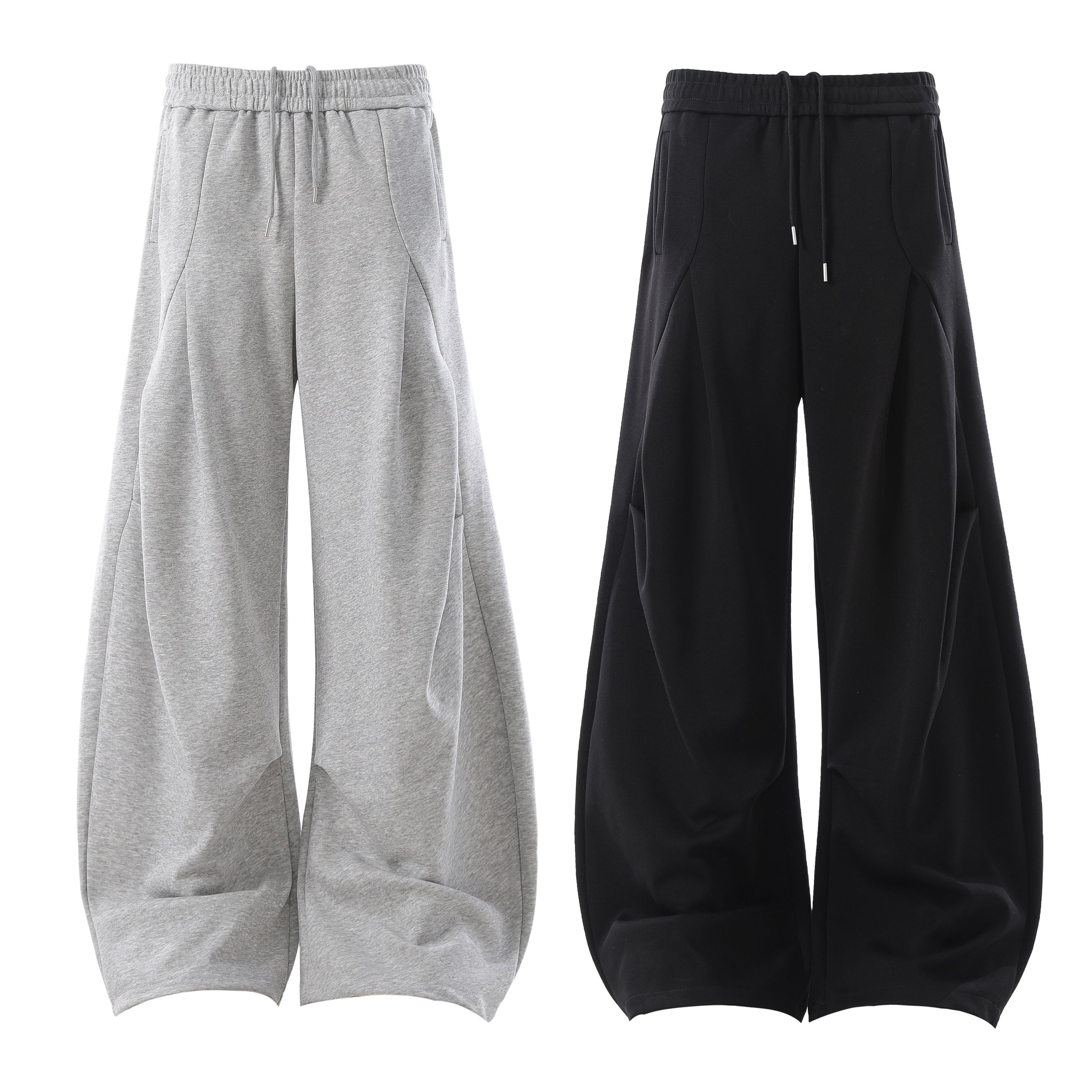 Heather grey and black sculpted wide-leg sweatpants with balloon silhouette and side pleats, shown flat on white background