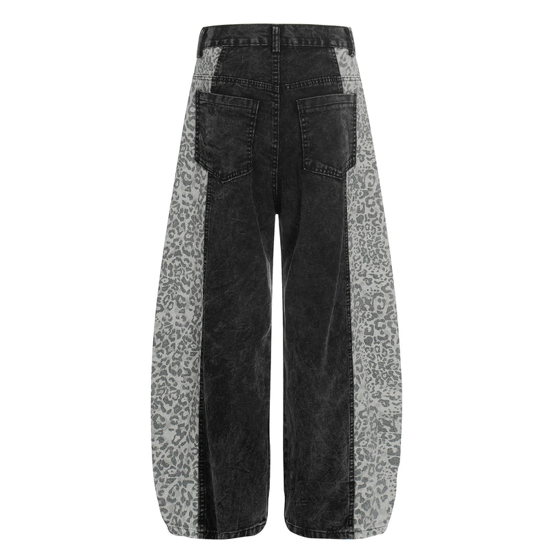 Black denim wide-leg pants with leopard side panels, back view