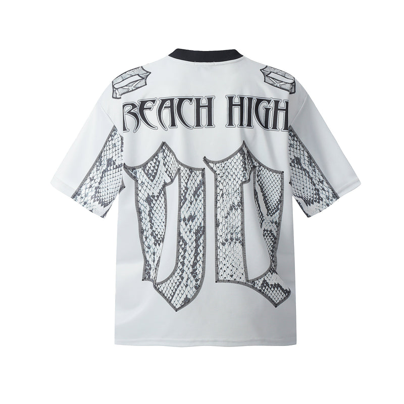 White oversized jersey tee with black Gothic BEACH HIGH lettering and snakeskin print details on the back