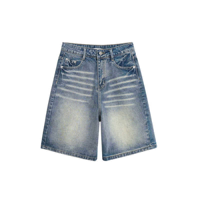 Front view of faded wide-leg denim shorts with whiskering, button fly, and curved front pockets