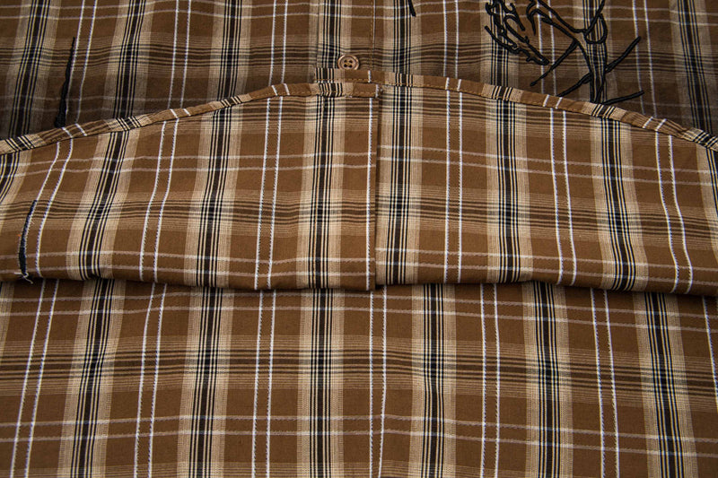 Brown vintage plaid shirt with black graphic embroidery, button collar, and retro streetwear style