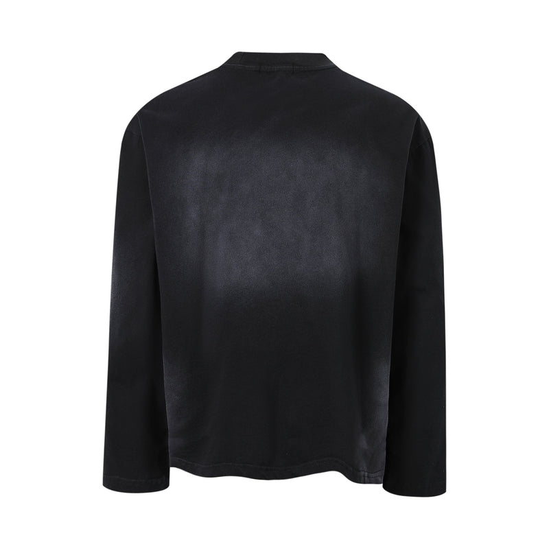 Back view of plain black long-sleeve tee with a crew neck