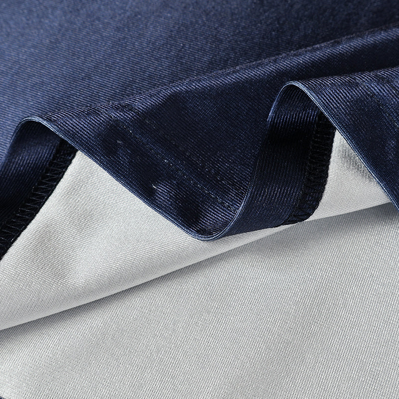 Close-up of navy and white jersey fabric with a smooth, textured finish for a varsity streetwear football shirt