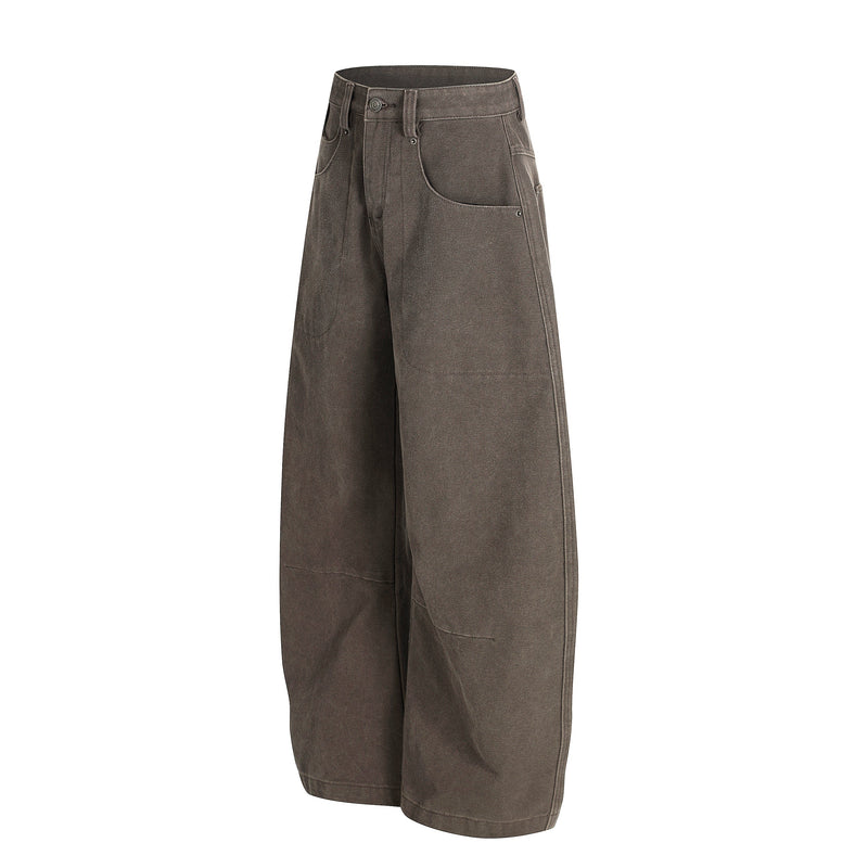 Side view of brown wide-leg utility trousers with oversized pockets