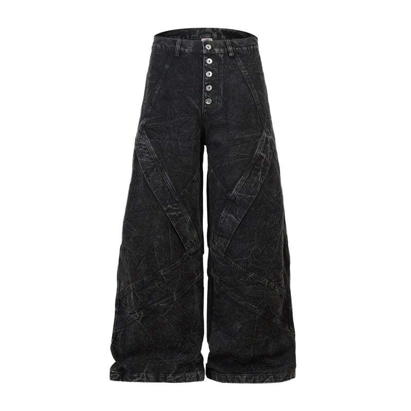 Black crinkle-wash wide-leg jeans with front button fly and oversized panel detailing