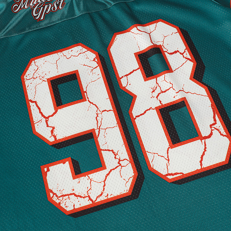 Teal football jersey with cracked white number 98 and red outline on textured sports mesh fabric