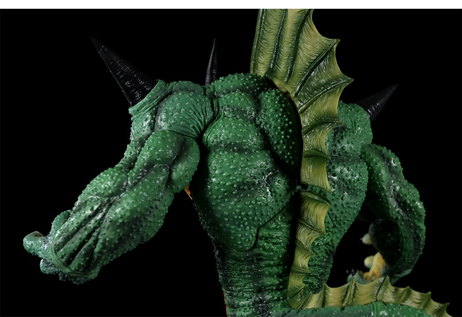 The Seakoff Shenron Broly Collectible Figure, a 37cm premium Dragon Ball Z figure, displays a green dragon-like creature with textured scales, large black head spikes, and spines along its back against a black background.