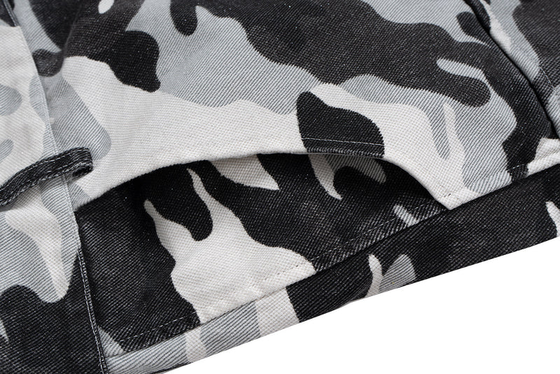 Close-up of camo shorts hem and stitched edge detail