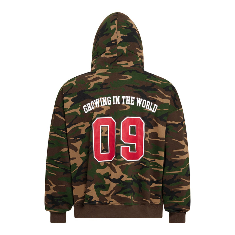 Back view of camouflage zip-up hoodie with large red 09 and Growing in the World text