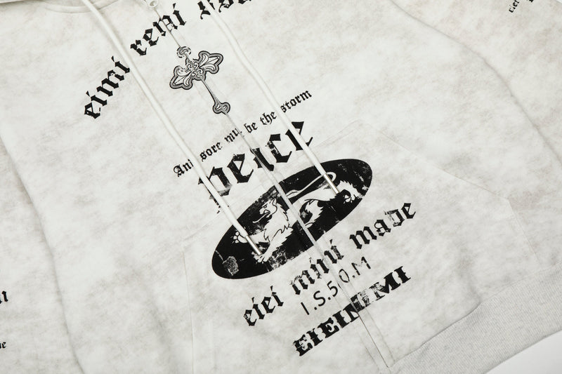 Angled front view of white zip-up hoodie with gothic text, drawstrings, and chest print